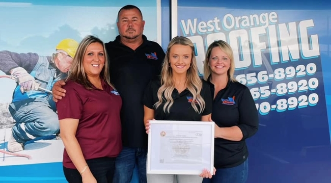 The West Orange Roofing team displaying their roofing certification