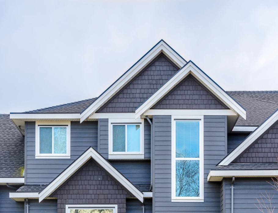 A home with a new asphalt shingle roof installed by West Orange Roofing