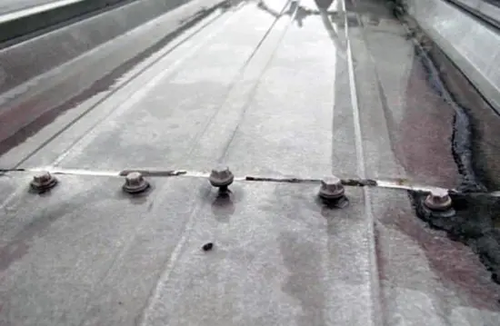 Loose fasteners on a commercial roof
